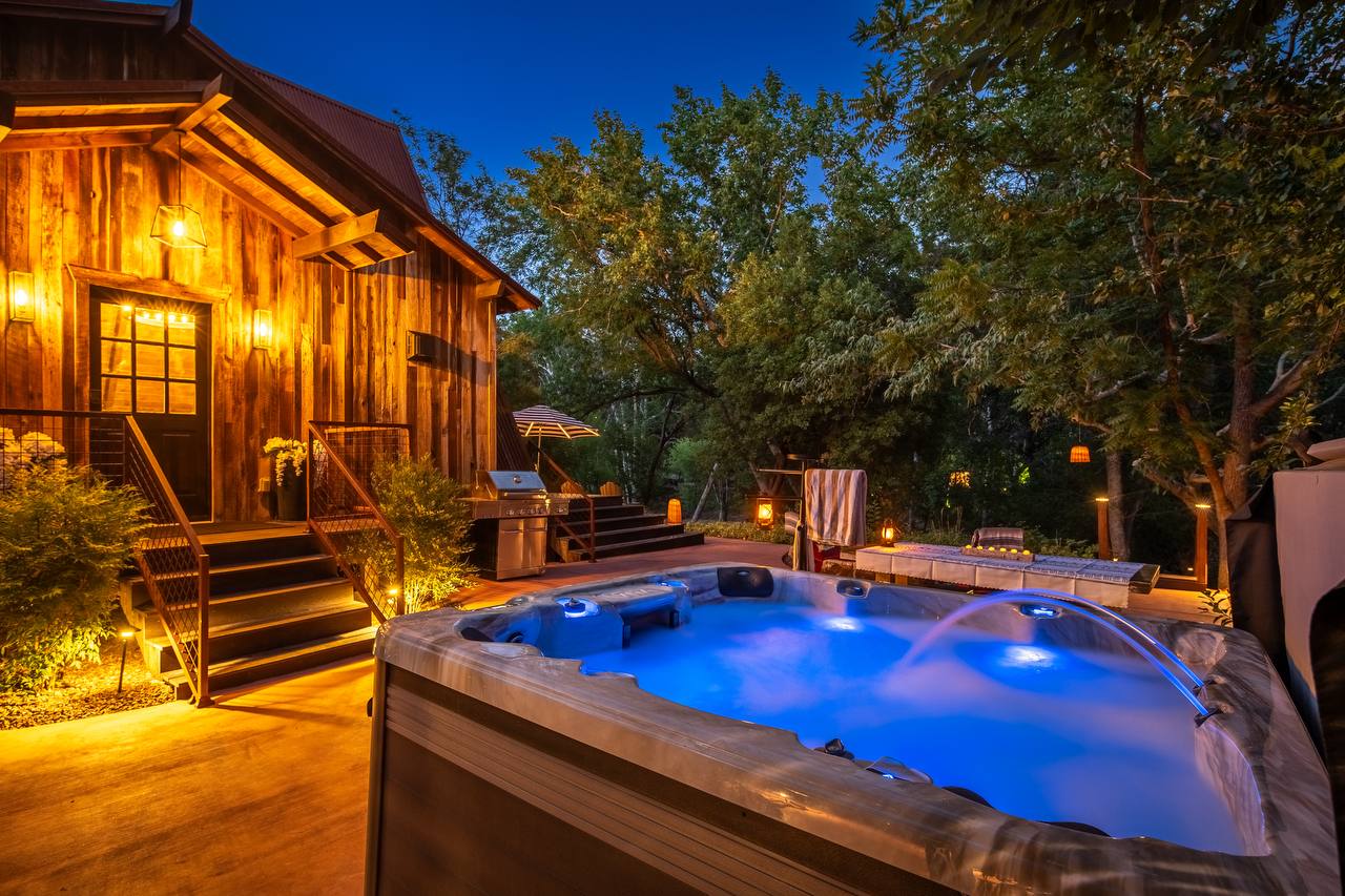 Hot tub close-up with water jets and blue glow — summer
